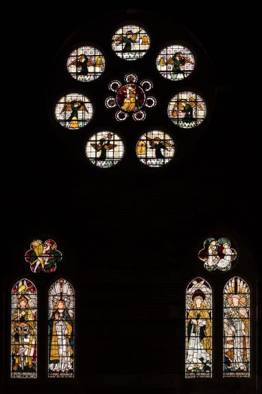 Morris, Marshall, Faulkner & Co. west window of the south aisle (1862). Left window left light St Michael by Ford Madox Brown, right light St Raphael by William Morris with face redrawn by Rossetti. Six foil above St Michael & the Dragon by Peter Paul Marshall. Right window left light St Uriel by Ford Madox Brown, right light St Gabriel by William Morris. Six foil above the Annunciation by William Morris. Rose window Virgin and Child surrounded by Angels playing bells by Edward Burne-Jones, St Michael & All Angels, Brighton Morris, Marshall, Faulkner & Co. west window of the south aisle (1862). Left window left light St Michael by Ford Madox Brown, right light St Raphael by William Morris with face redrawn by Rossetti. Six foil above St Michael & the Dragon by Peter Paul Marshall. Right window left light St Uriel by Ford Madox Brown, right light St Gabriel by William Morris. Six foil above the Annunciation by William Morris. Rose window Virgin and Child surrounded by Angels playing bells by Edward Burne-Jones, St Michael & All Angels, Brighton | Photo: Peter Hildebrand